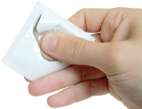 One-handed condom wrapper (c) Benjamin Pawle